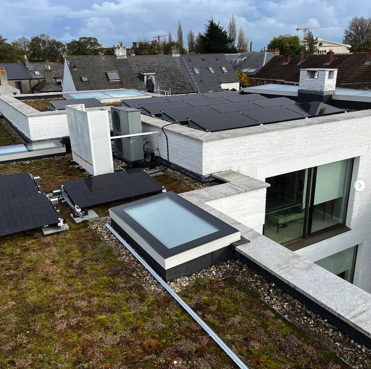 Panels on a flat green roof at a commercial building