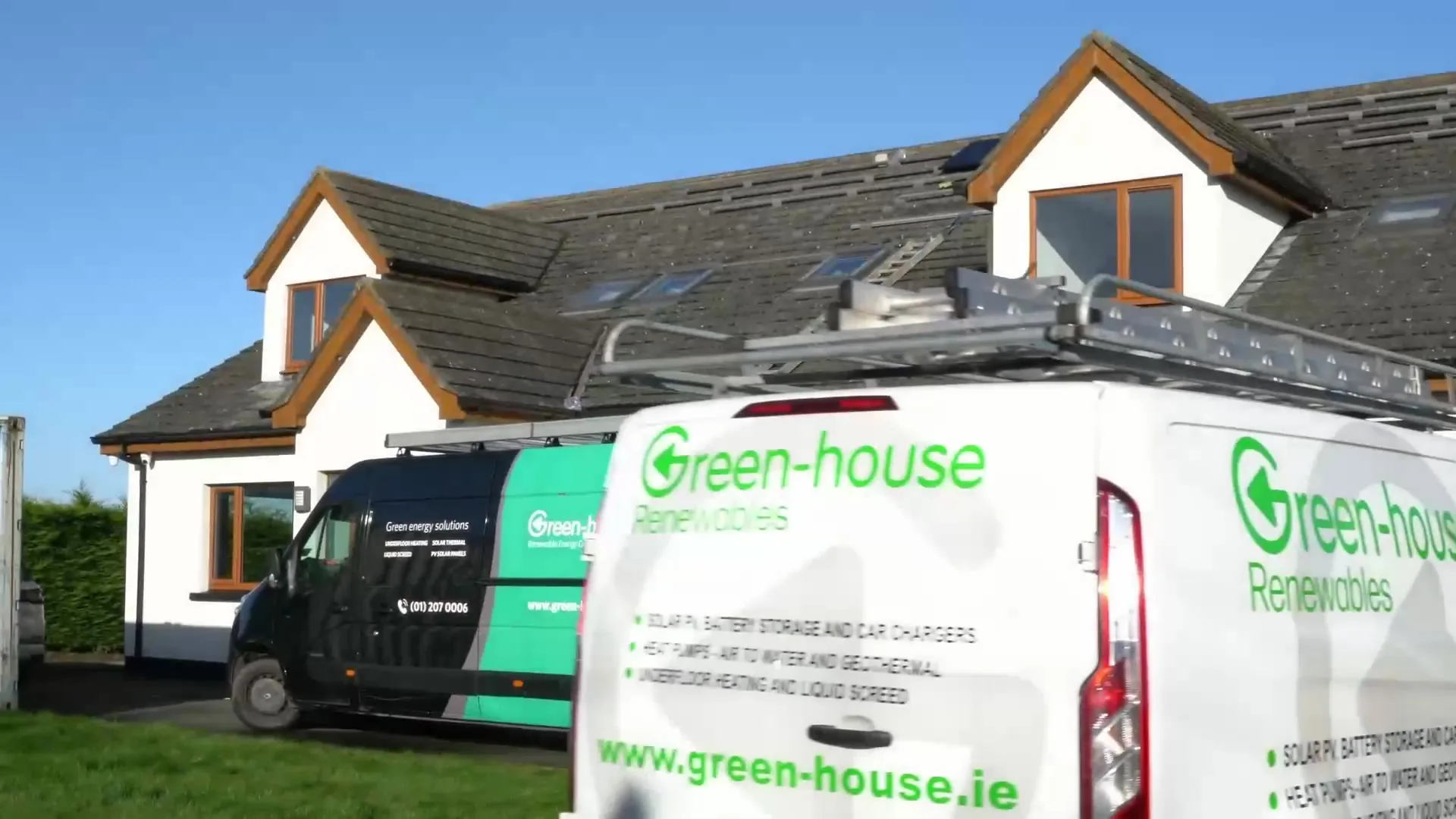 Green-house van outside a completed dormer installation